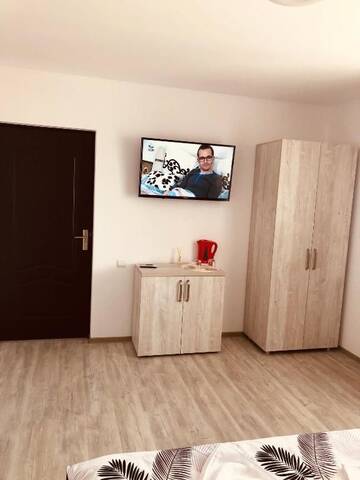 Фото номера Номер Делюкс (для 2 взрослых и 1 ребенка) Гостевой дом Casa Clau Cazare Orșova г. Оршова 5