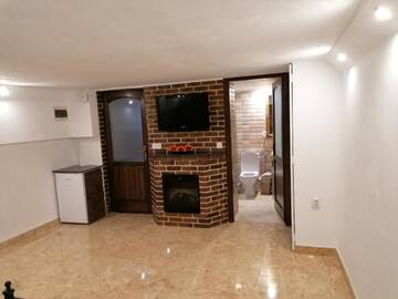 Фото номера Улучшенный двухместный номер с 1 кроватью Гостевой дом Casa Evelyn г. Оршова 10