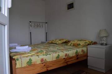Фото номера Дом с 2 спальнями Дома для отпуска AXY г. Оршова 15
